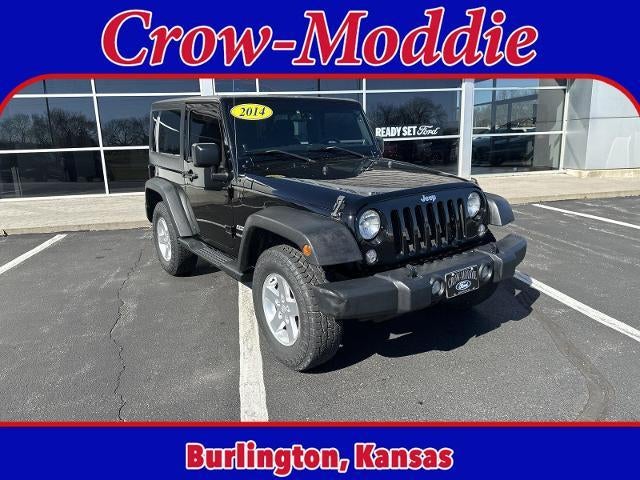 2014 Jeep Wrangler 4WD 2dr Sport in Black Clearcoat — front three-quarter view